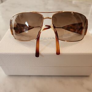 Prada tortoise with gold sunglasses